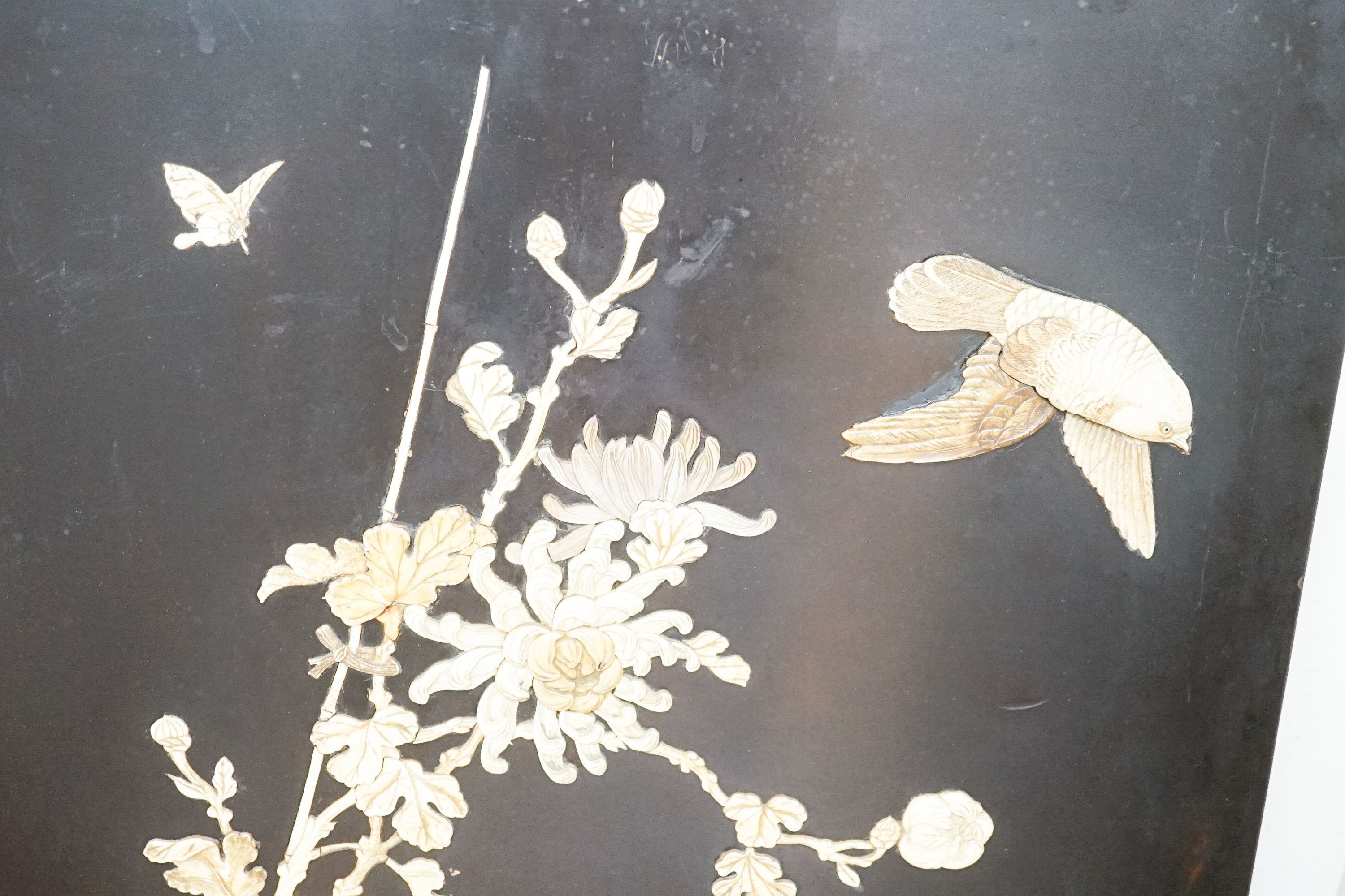 A pair of late 19th century Japanese bone and mother of pearl inlaid shibayama style panels of birds amid flowers, 91 x 51cm